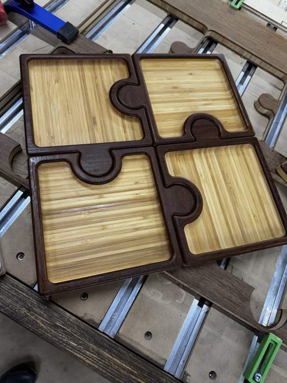 Nested puzzle piece serving trays, real product photo